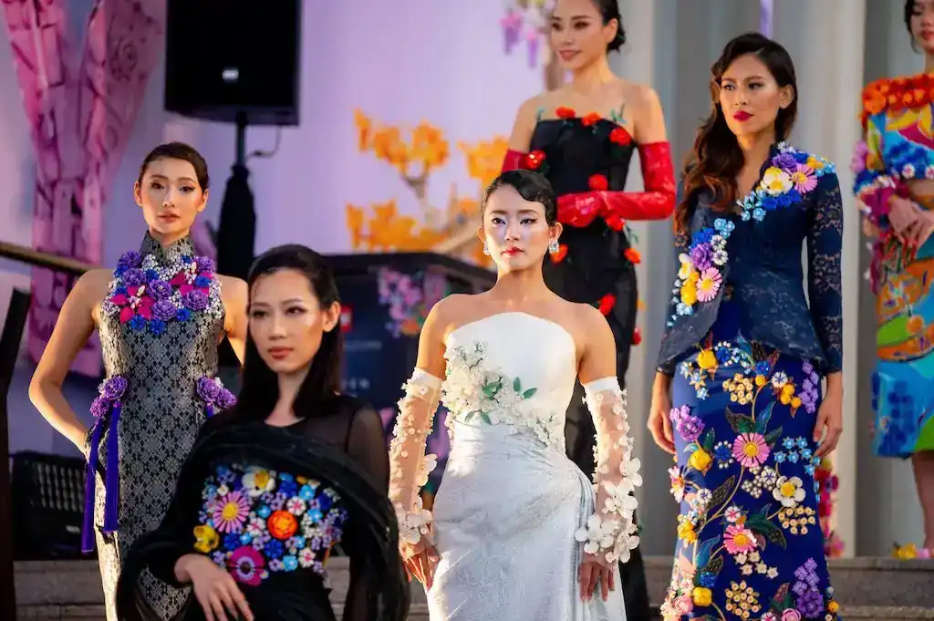 Models wearing LEGO Botanicals–inspired couture designed by MODA members at the Pavilion Kuala Lumpur fashion showcase.
