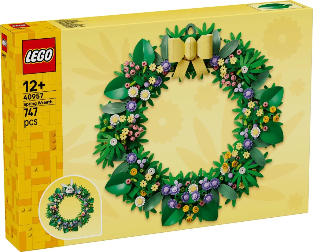 Front view of the LEGO Spring Wreath 40957 box showing a colorful brick-built floral wreath with flowers, greenery, and a yellow bow.
