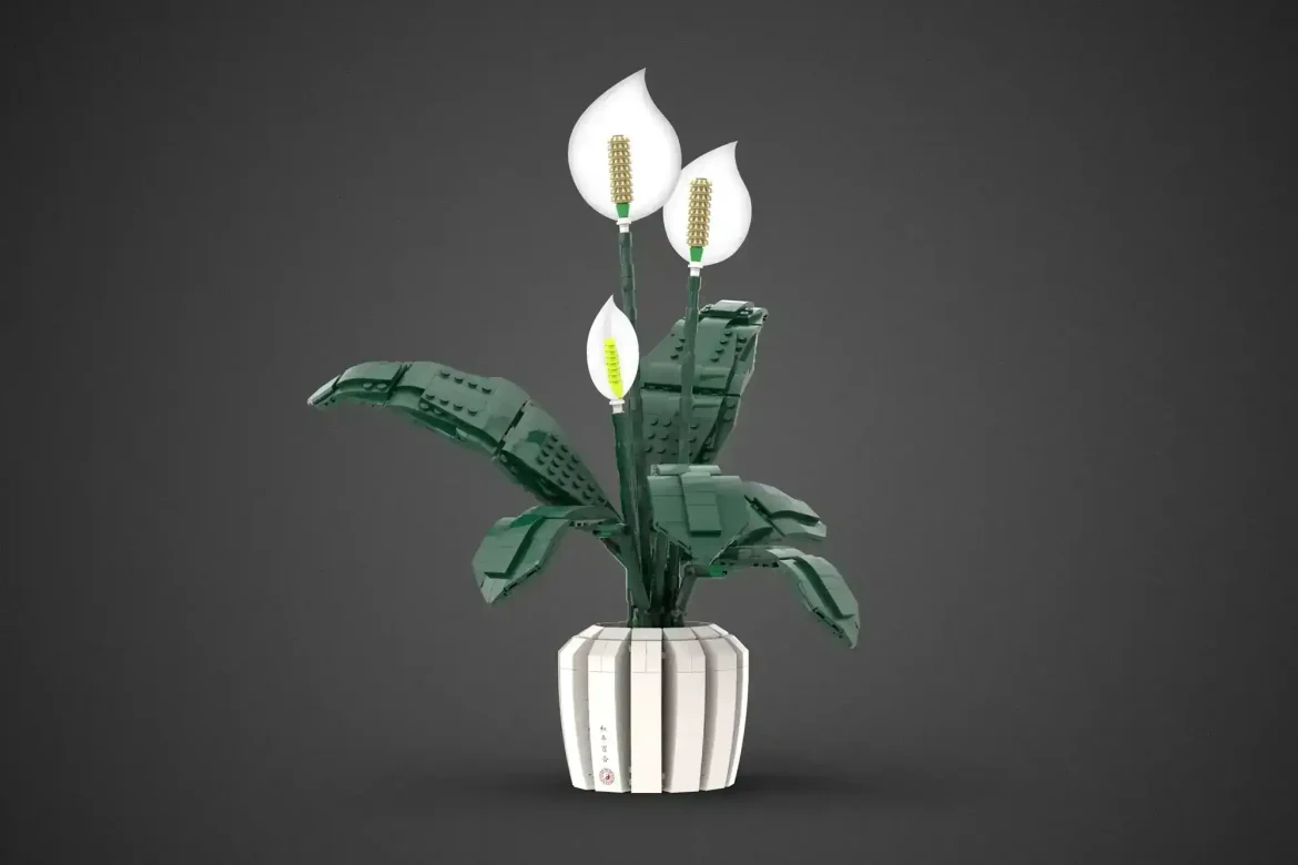 LEGO Ideas Peace Lily by Thiago Brisolla fan design featuring white LEGO flowers and dark green leaves in a minimalist pot.