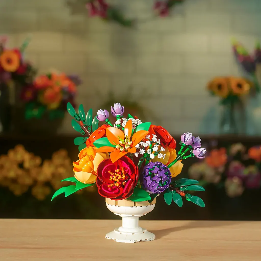 LEGO Botanicals flower arrangement centerpiece with colorful blooms arranged in a decorative pedestal bowl.