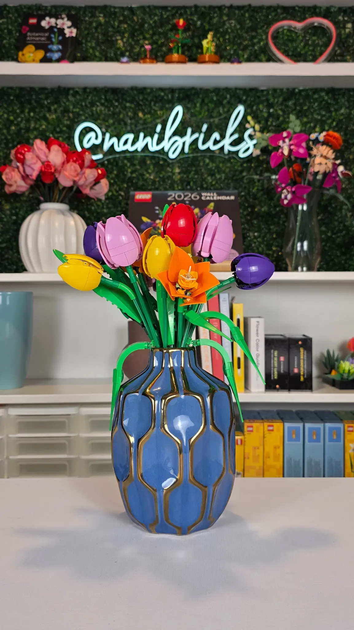 LEGO Botanicals Tulip Bouquet (11501) displayed in a blue ceramic vase as colorful home decor.