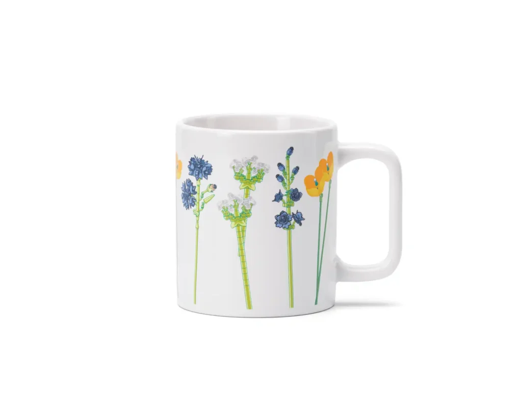 LEGO ceramic mug featuring wildflower graphics inspired by LEGO Botanicals on a white mug.