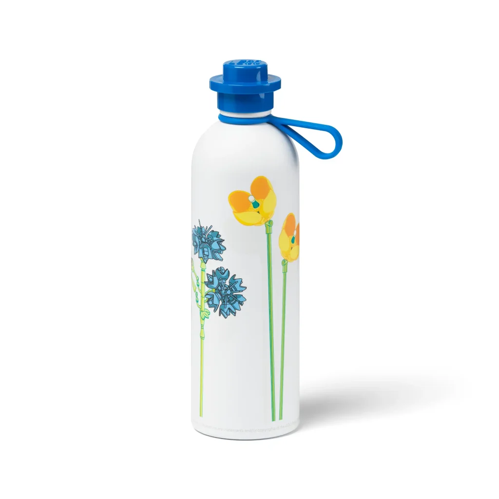 LEGO thermo bottle with wildflower graphics inspired by LEGO Botanicals and a blue stud-style lid.