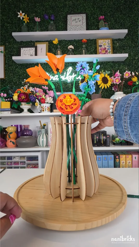 Adding larkspur to LEGO flower arrangement for height and movement