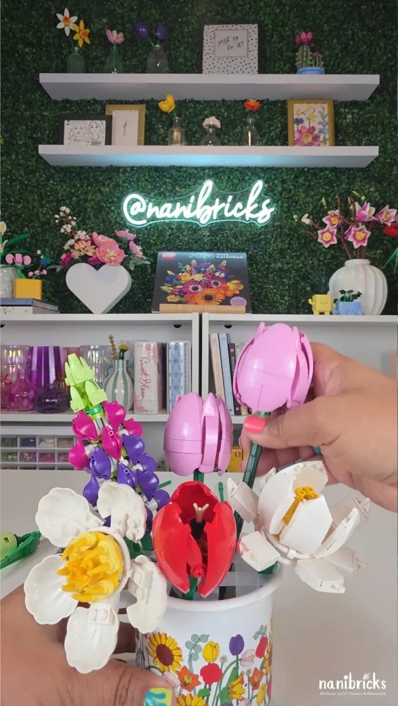 placing LEGO tulips in mug arrangement to create shape and structure