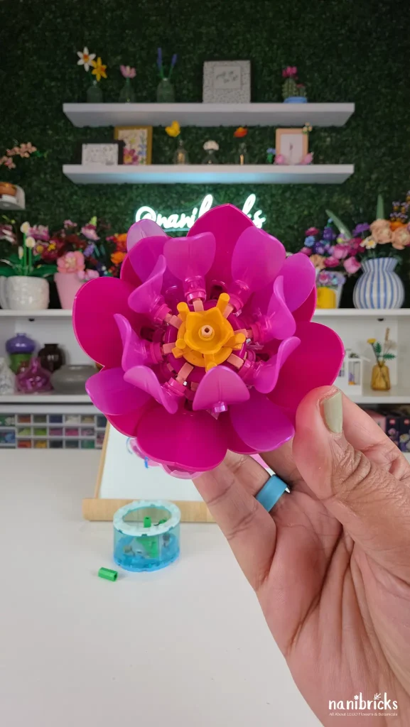 Close-up of the pink water lily from LEGO Botanicals Water Lilies 11511 showing layered petals and iridescent inner details