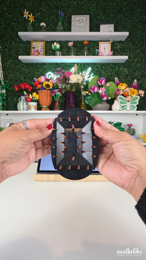 LEGO Dark Flower Arrangement 11513 black vase held in one hand